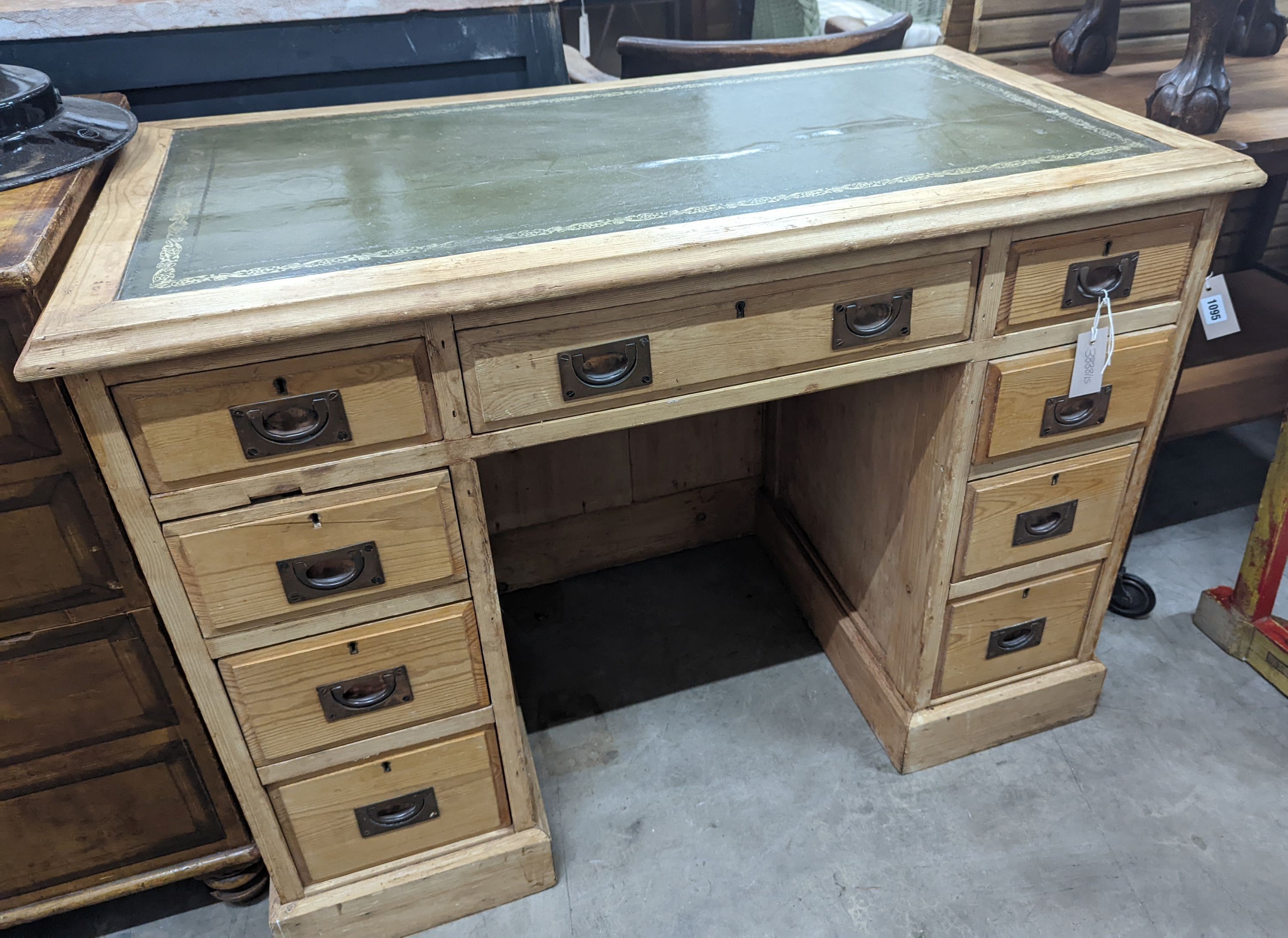 A late Victorian military style pine kneehole desk, width 102cm, depth 55cm, height 75cm